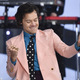 Image for article titled Harry Styles's Car Broke Down in Front of a Fan's House, So He Fed Her Fish (This Is Not Fanfic)